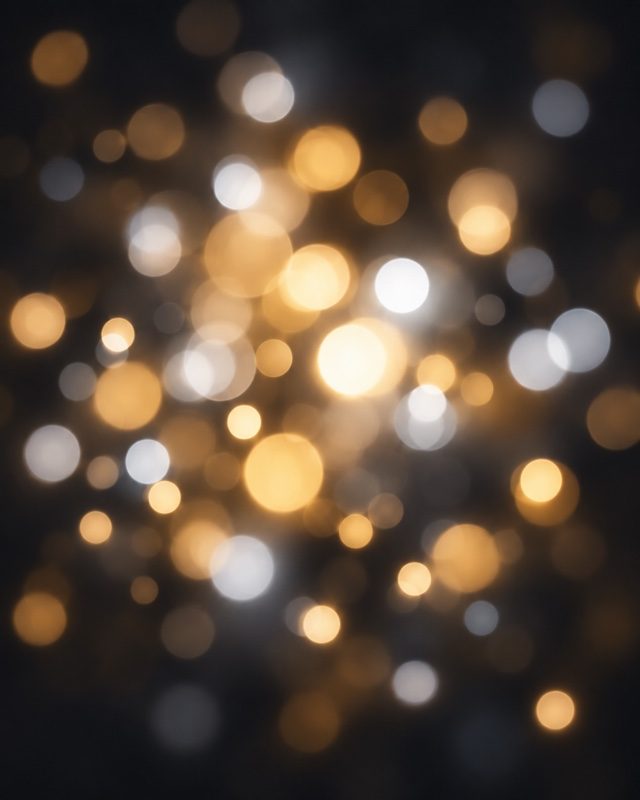 Example of the Bokeh lights look: soft golden and white circles of out-of-focus light on black