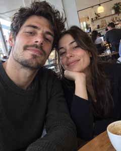 Example phone photo: a selfie of a couple at a café table